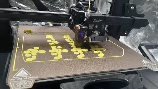 Photo of a series of models on the buildplate with only the second, third and fourth sets printing reliably
