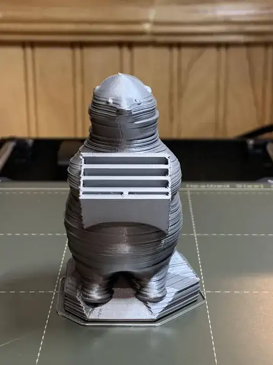 Test print of an SD card bear holder, layer lines seem to be sticking out