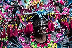 Participant with headgear during the Ati-Atihan festival