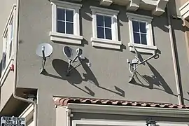 Image 25DBS satellite dishes. (from History of television)
