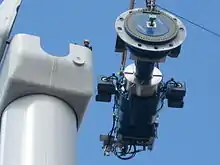 Image 22Components of a horizontal axis wind turbine (gearbox, rotor shaft and brake assembly) being lifted into position (from Wind turbine)