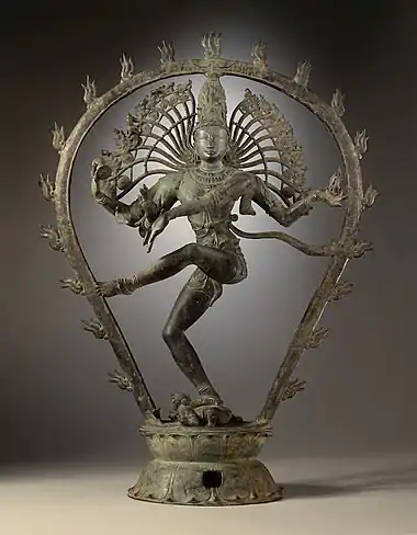Restrained double-lotus throne typical of Chola bronzes, when they have them at all.  Shiva Nataraja, 10th century.